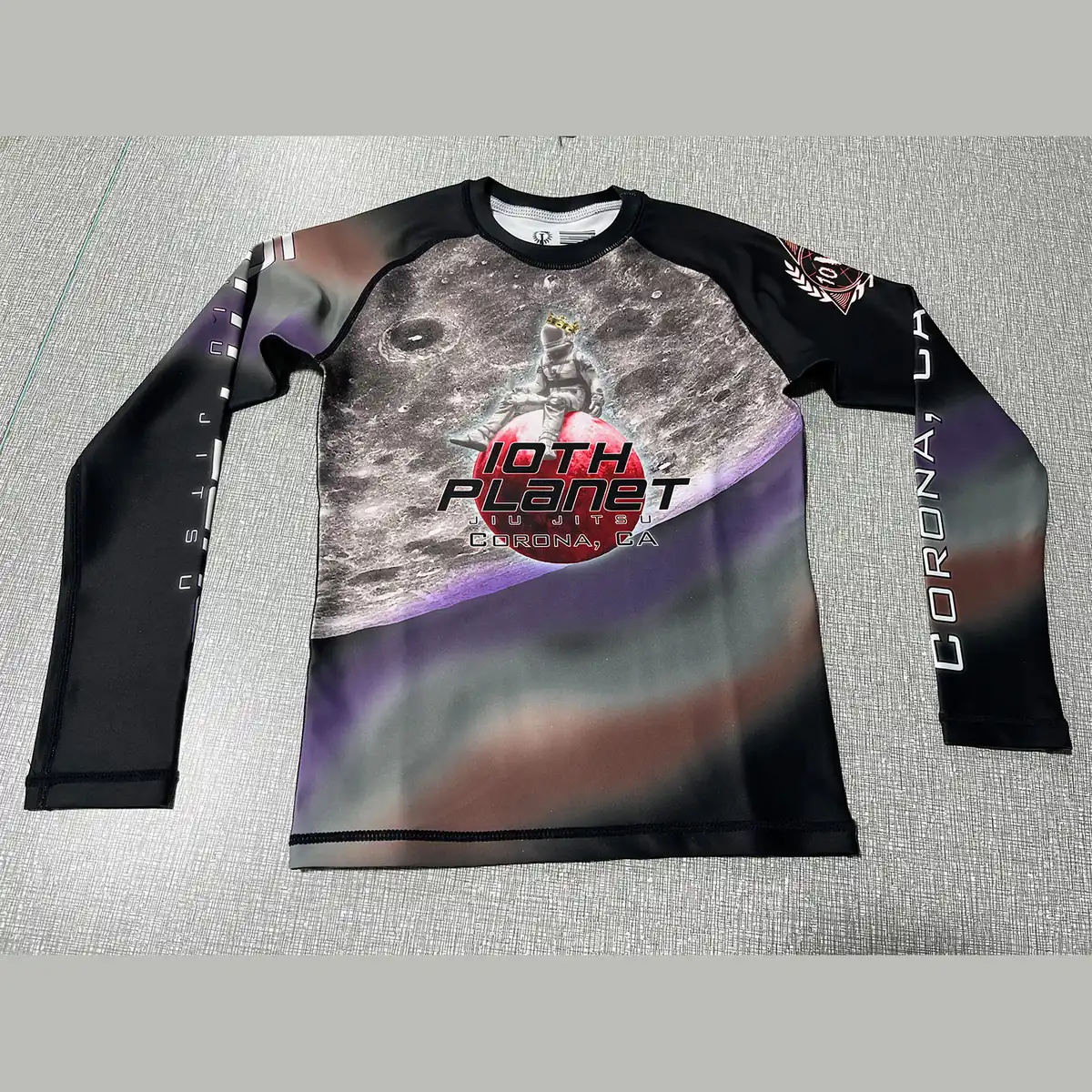 Custom team long sleeve rash guard with full sublimation print, front and back views