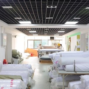 Fabric roll warehouse at Glory Ground sportswear factory in Shenzhen