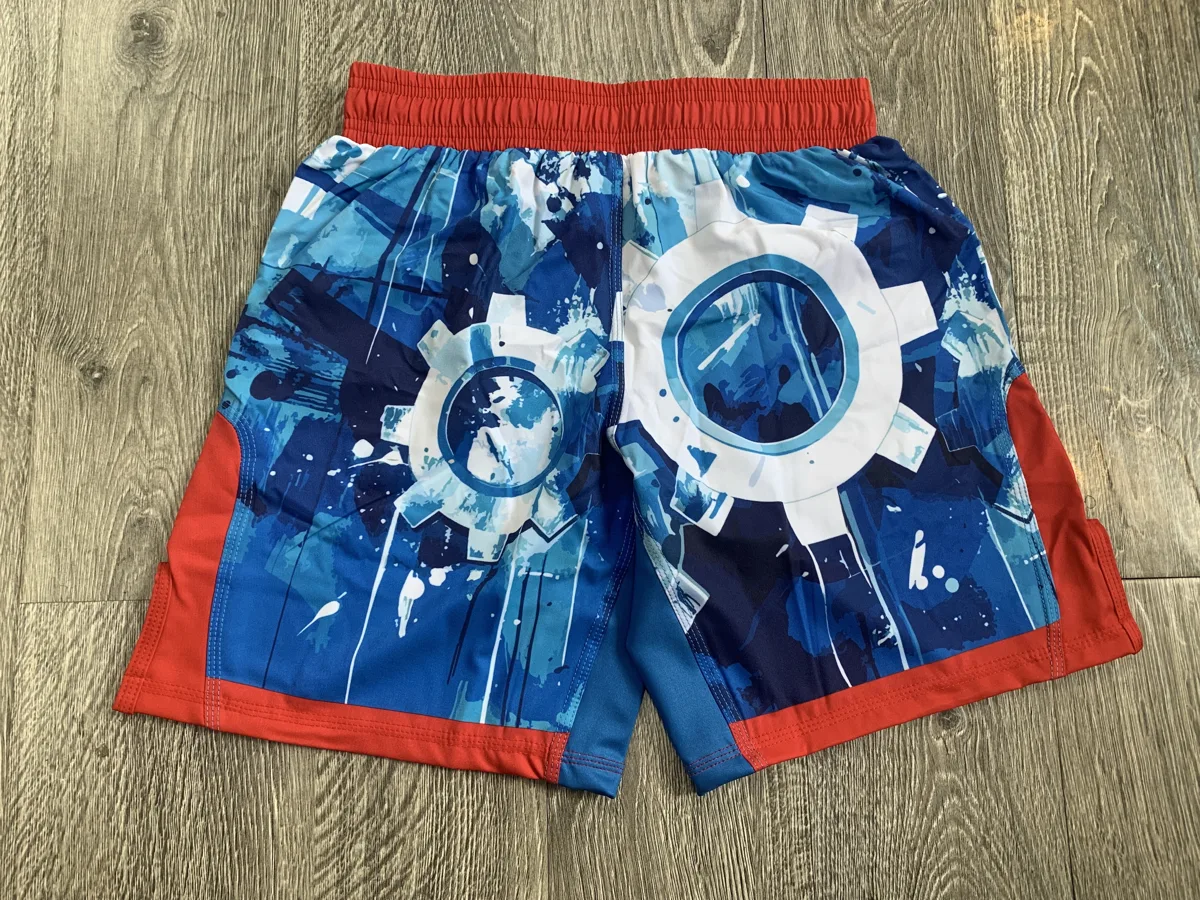 MMA Shorts – Blue Gear Print - custom sportswear manufacturer Glory Ground Apparel