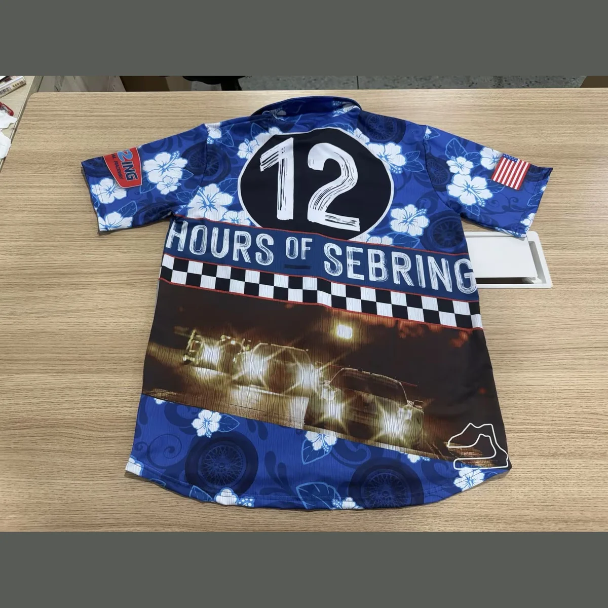 Custom full sublimation button-up camp shirt with all-over floral print, front and back