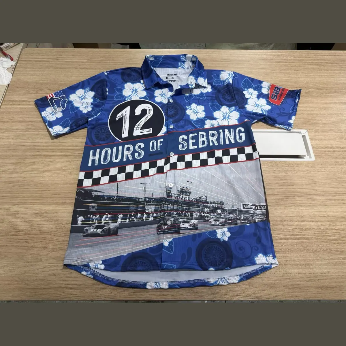Custom full sublimation button-up camp shirt with all-over floral print, front and back